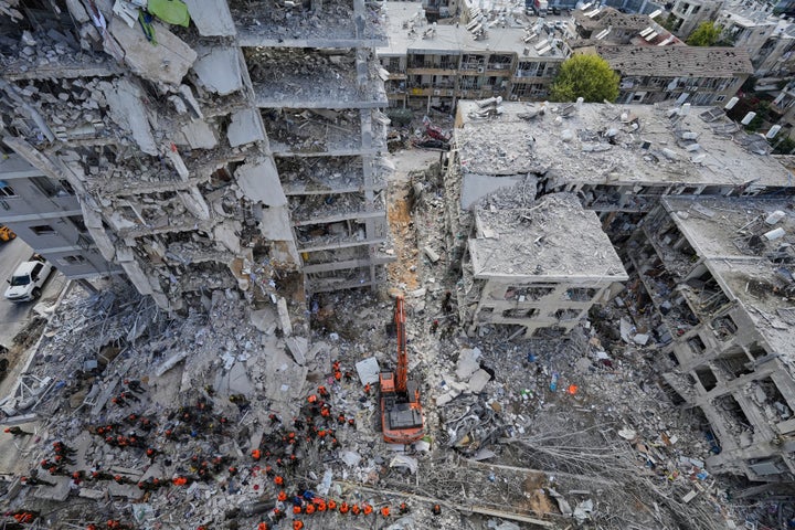 Israeli soldiers search through the rubble of residential buildings destroyed by an Iranian missile strike in Bat Yam, Israel, on June 15, 2025.