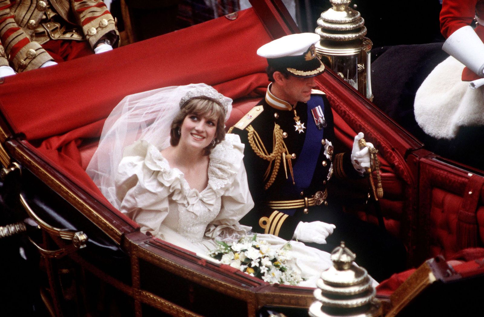 Image may contain Diana Princess of Wales Person Clothing Hat Glove Adult Wedding Face Head and Photography