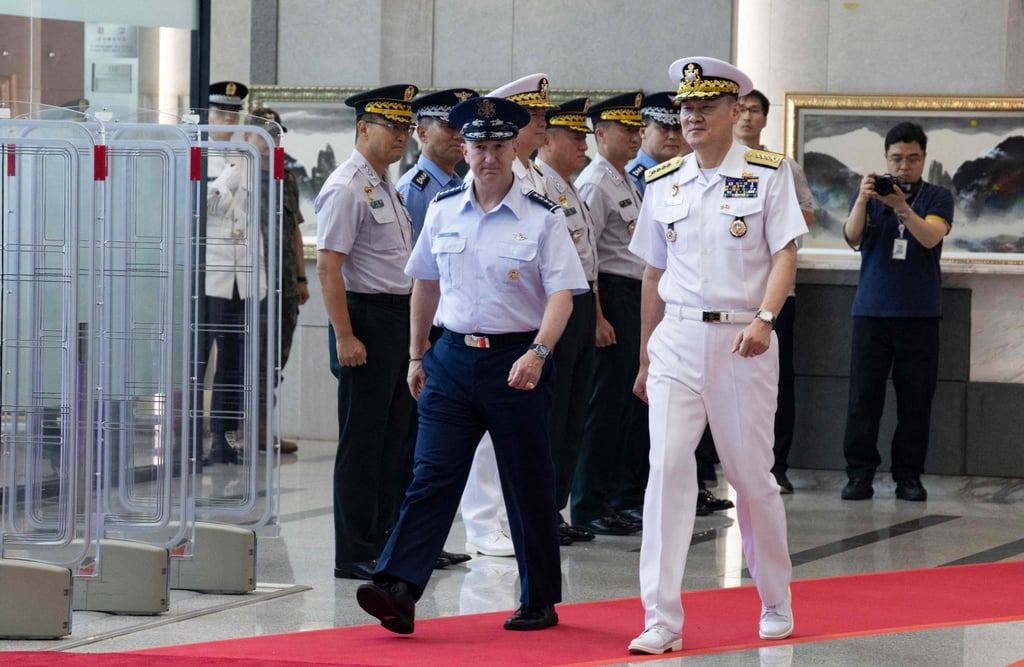 US Chairman of the Joint Chiefs of Staff Air Force General Dan Caine (left) and Admiral Kim Myung-soo, chairman of South Korea’s Joint Chiefs of Staff, inspect a guard of honour at the Ministry of National Defence in Seoul on Thursday. Photo: AFP US Chairman of the Joint Chiefs of Staff Air Force General Dan Caine (left) and Admiral Kim Myung-soo, chairman of South Korea’s Joint Chiefs of Staff, inspect a guard of honour at the Ministry of National Defence in Seoul on Thursday. Photo: AFP