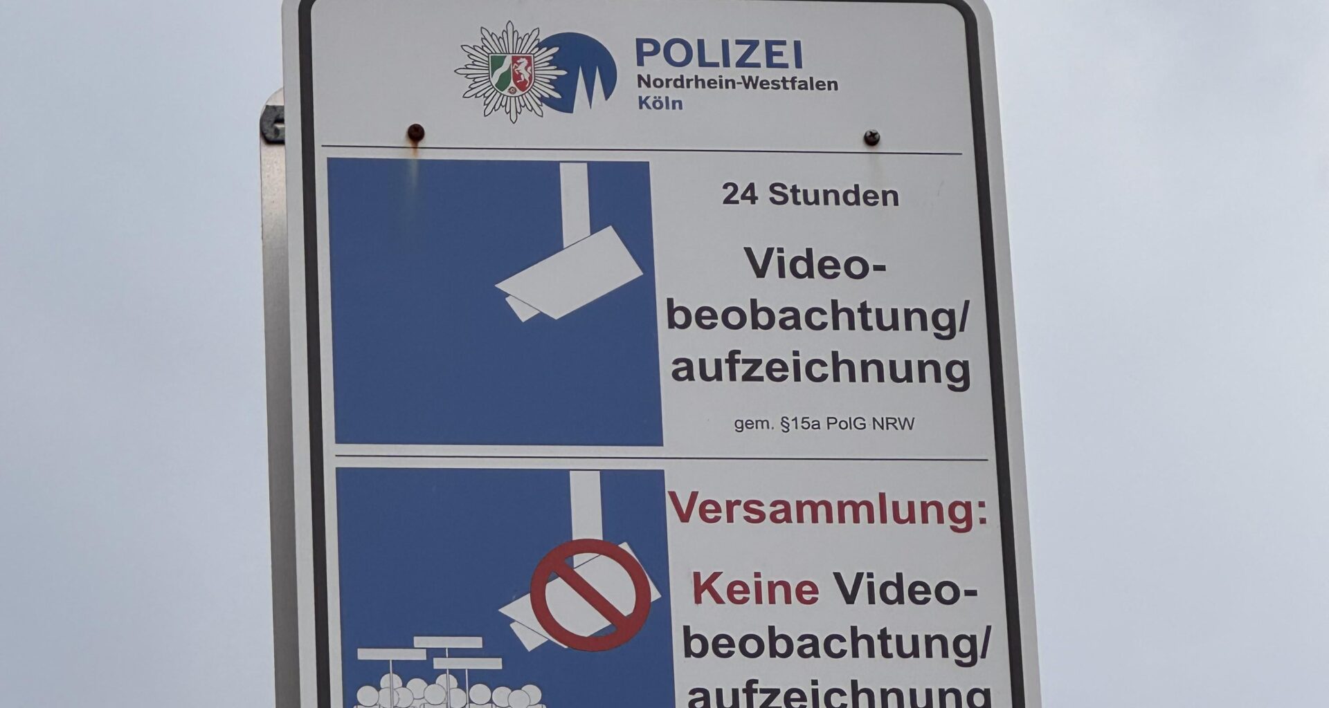 This police sign in Cologne, Germany, says they turn off  their surveillance cameras during public protests.