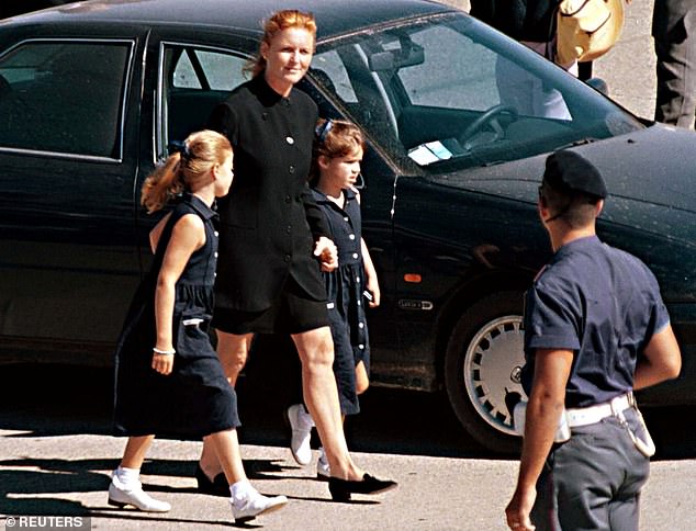 The Duchess of York, Sarah Ferguson, (2L) with her children at Pisa airport before leaving for London in 1997