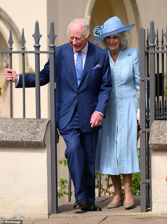 Meanwhile the King matched his wife of 20 years in a dark blue suit, adding a touch of spring to his outfit with a pastel pink shirt and bright blue castle-print tie
