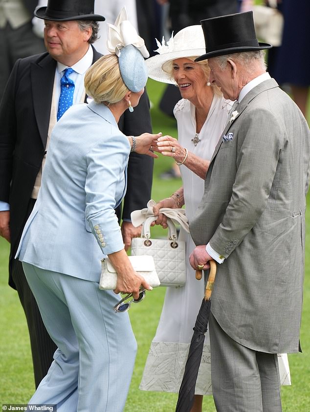The royals were all smiles as they stepped out at the festival for another day of racing action