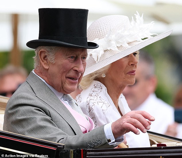 King Charles and Queen Camilla during the royal procession ahead of the races
