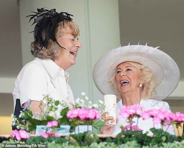 Queen Camilla (right) speaks with a guest on day four of Royal Ascot