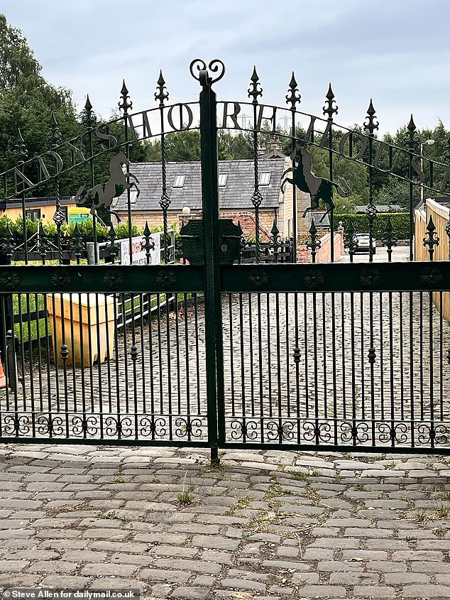 The imposing bungalow can be seen from the gated entrance to the estate