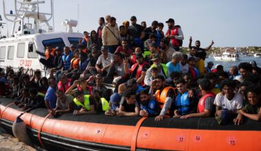 Migrants arrive in the harbour of Italian island of Lampedusa, on 18 September 2023