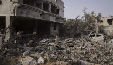A Palestinian girl stands atop the rubble of the Al-Aimawi family's home that was destroyed by Israeli airstrikes in Al-Zawaideh, Gaza Strip, Tuesday, July 1, 2025. (Abdel Kareem Hana/AP)