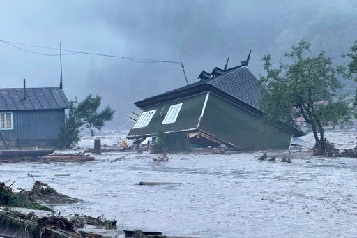 Flash floods in Romania kill at least 3 people and force hundreds of evacuations