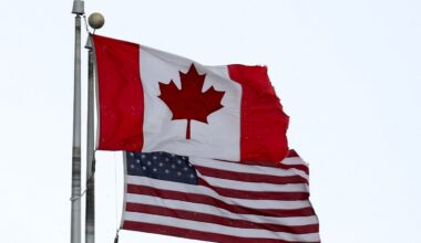 A Canadian flag flew next to the American one at the Lewiston-Queenston border crossing bridge on Feb. 4 in Niagara Falls, Canada.