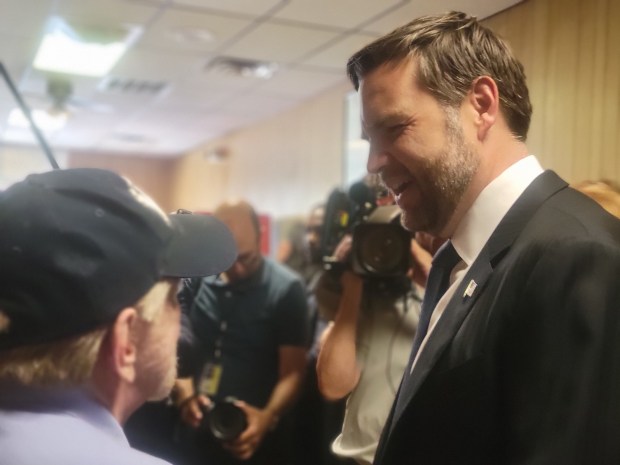 Vice President JD Vance speaks to Navy veteran Jack Jones...