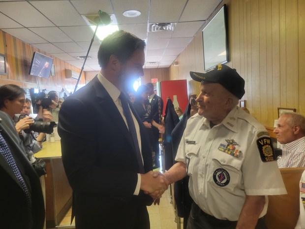 Vice President JD Vance shakes hands with 95-year-old Korean War...