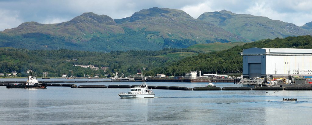 SUBMARINE SERVICE BIDS FAREWELL TO COMMODORE AS NEW HEAD ARRIVES Pictured: HMS Raider leaving HMNB Clyde with the now former head of the RN Submarine Service, Commodore Perks. Today, 26 July 2022, the head of the Royal Navy Submarine Service, Commodore Jim Perks CBE, retired from the Senior Service during a ceremony at HM Naval Base Clyde. Commodore Perks took command of the Submarine Flotilla back in 2016 and became head of the submarine fighting arm in January 2020. The appointment was the highlight of an illustrious 38-year naval career which saw him begin as a Royal Navy Rating. Friends and colleagues from the Flotilla gathered at the Home of the UK Submarine Service for the supersession which was held outside the site’s Belmore House. Accompanied by his wife, Louise, the Commodore conducted a farewell tour of the base’s Valiant and Finger jetties where he overseen so many submarine missions during his time in post. The couple were then whisked away by water, boarding Faslane Patrol Boat HMS Raider, which transported Commodore Perks down the Gare Loch for the final time. Credit: Leading Photographer Bill Spurr