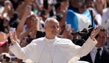 Pope Leo XIV gestures as he arrives for his weekly general audience in St. Peter's Square at The Vatican, Wednesday, June 4, 2025. (AP Photo/Gregorio Borgia, File)