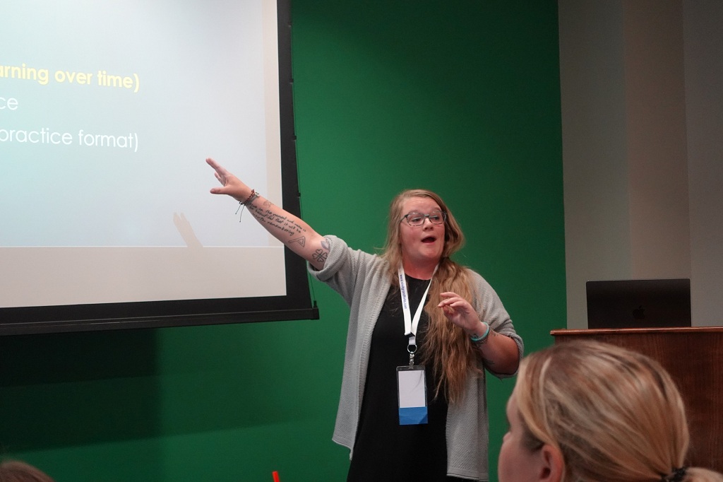 Jaclynn Lenz leads a math workshop at Pages & Pathways Conference.