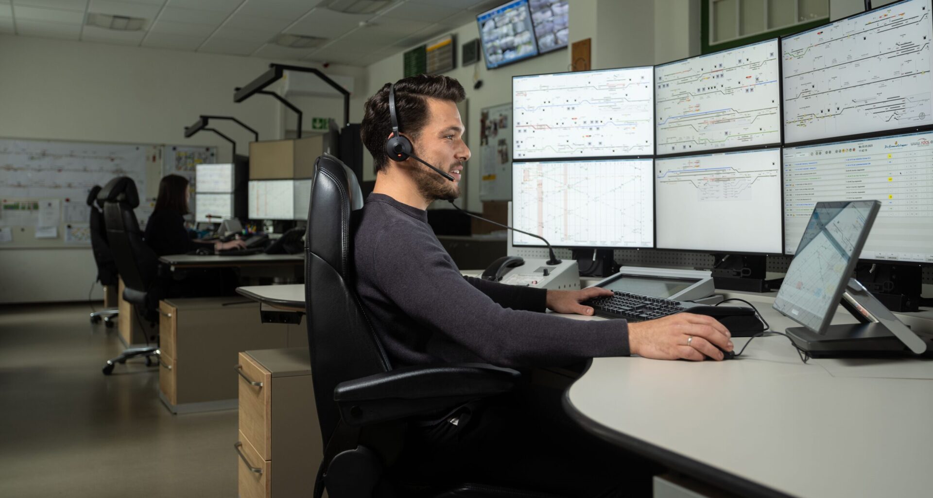 Dispatcher at work in rail control centre Laubenbachmühle