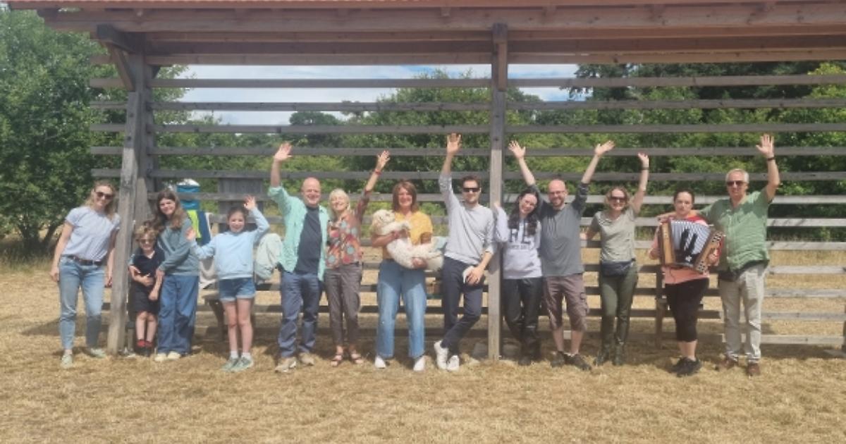 Slovenian friends make song and dance in field