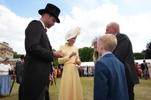 LONDON, ENGLAND - MAY 20: Prince William, Prince of Wales and Catherine, Princess of Wales receive Jellycat soft toys and meets the family of Liz Hatton, mother Vicky Robayna, father Aaron and brother Mateo at a Royal Garden Party at Buckingham Palace on May 20, 2025 in London, England. Liz Hatton a cancer campaigner and photography prodigy from Harrogate, passed away at the age of 17 in November 2024 from a rare and largely untreatable cancer. (Photo by Aaron Chown - WPA Pool / Getty Images)