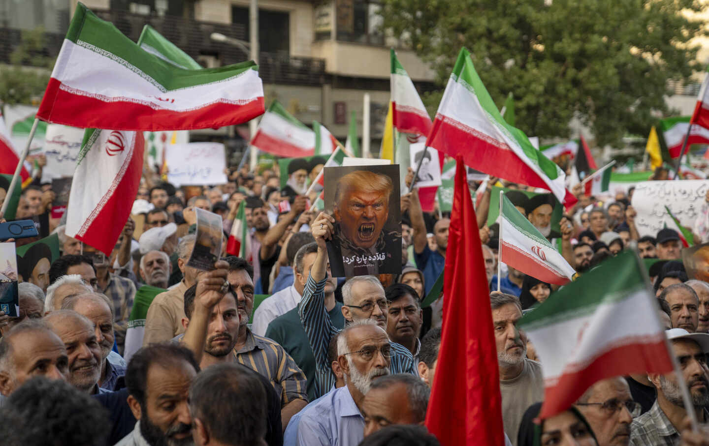 Iranian protesters chant slogans to protest US attacks on June 22, 2025, in Tehran, Iran.