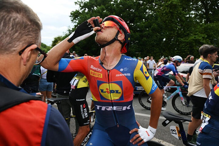 Milan necks what appears to be a ketone shot at Tour de France