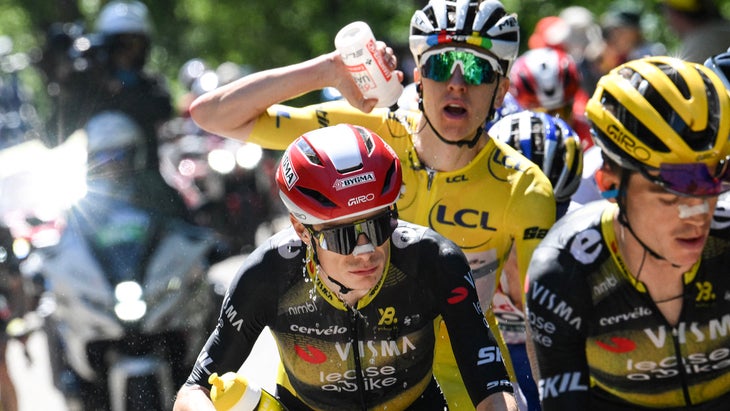Team Visma - Lease a bike team's Danish rider Jonas Vingegaard and UAE Team Emirates - XRG team's Slovenian rider Tadej Pogacar wearing the overall leader's yellow jersey cycle in the ascent of Mont Ventoux during the 16th stage of the 112th edition of the Tour de France cycling race, 171.5 km between Montpellier and Mont Ventoux, southern France, on July 22, 2025. (Photo by Bernard PAPON / AFP) (Photo by BERNARD PAPON/AFP via Getty Images)
