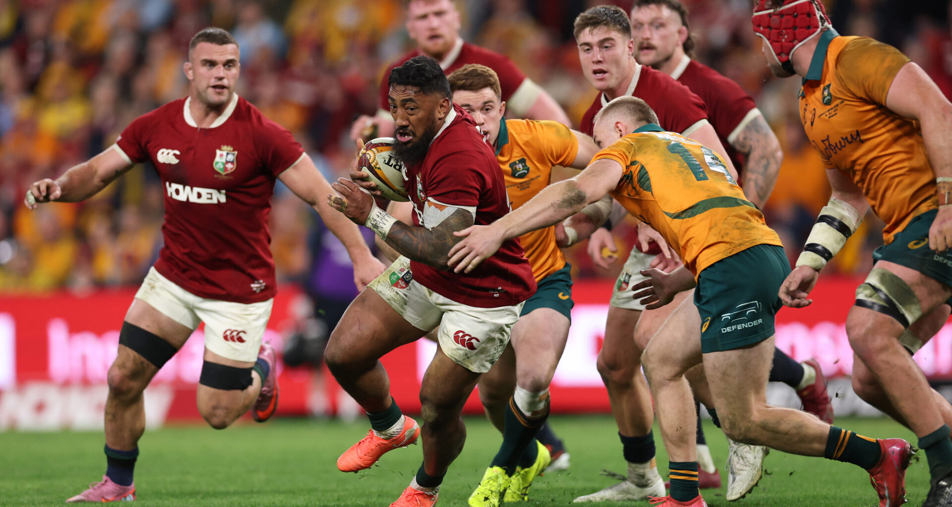 Bundee Aki of the British & Irish Lions runs with the ball during the first 2025 Test against Australia.
