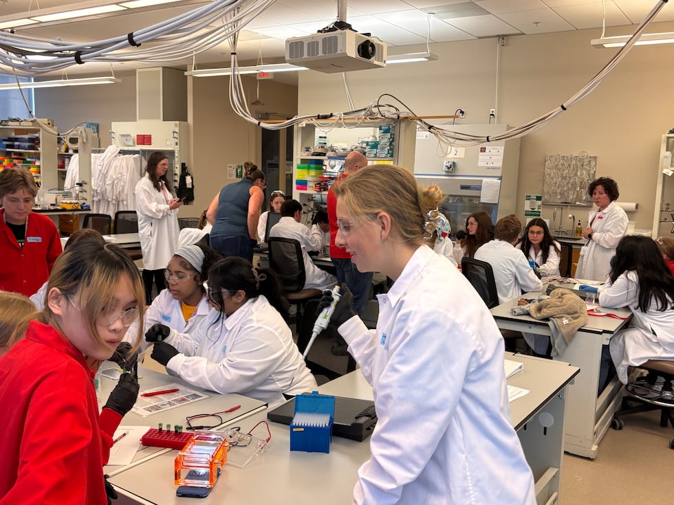 Students from rural high schools participating in science experiments at the UW-Madison...