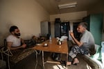 Firefighters Mohammed Khdeir and Mahdi Sliman have