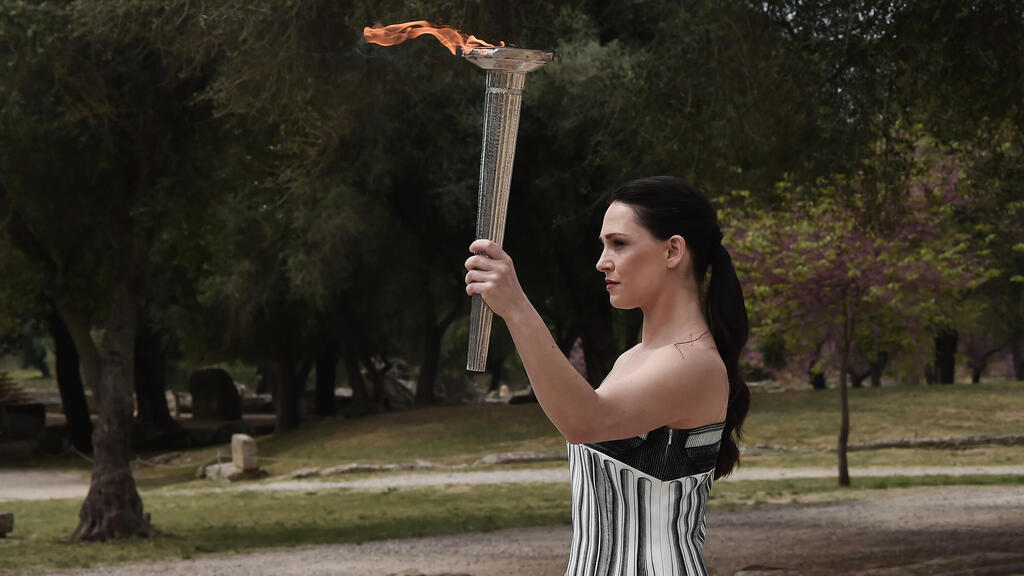 העברת הלפיד האולימפי. אין זה מקרה שהמשחקים האולימפיים נוסדו ביוון