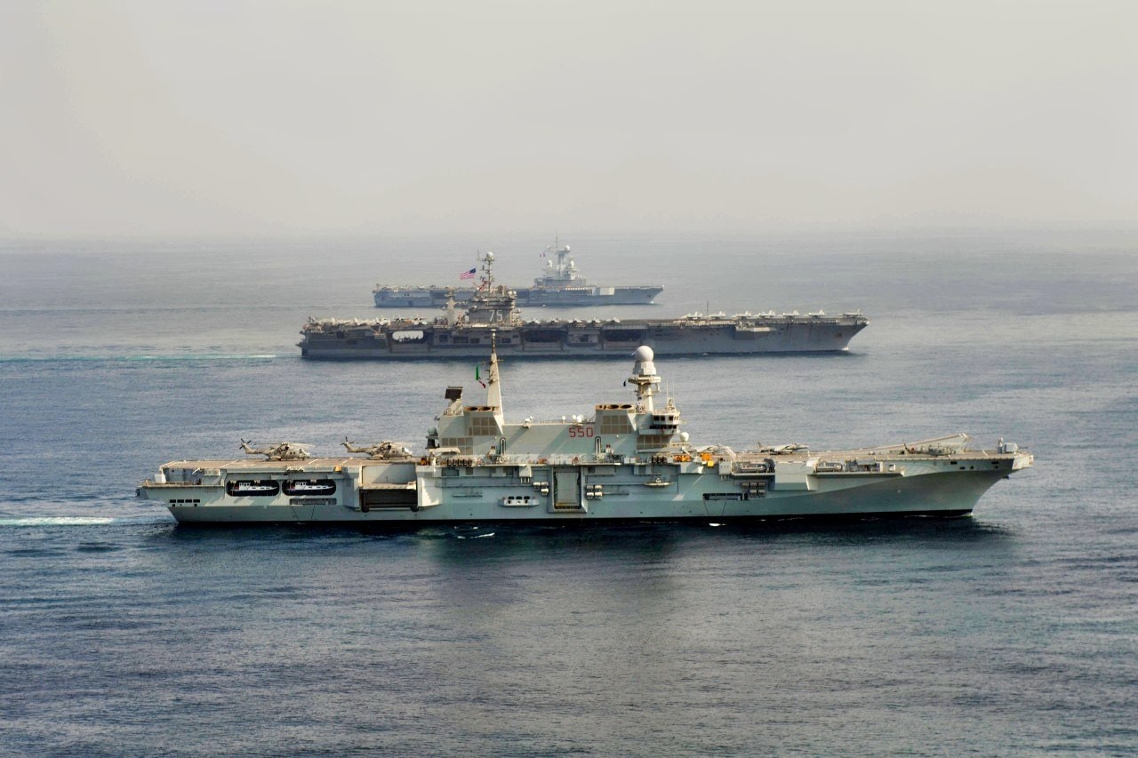 (Jan. 3, 2014) The Italian navy aircraft carrier ITS Cavour (CVH 550), front, the aircraft carrier USS Harry S. Truman (CVN 75) and the French navy aircraft carrier Charles de Gaulle (R 91), conduct operations in the Gulf of Oman. Harry S. Truman, flagship for the Harry S. Truman Carrier Strike Group, is conducting operations with Task Force 473 to enhance levels of cooperation and interoperability, enhance mutual maritime capabilities and promote long-term regional stability in the U.S. 5th Fleet area of responsibility. (U.S. Navy photo by Mass Communication Specialist 3rd Class Ethan M. Schumacher/Released)