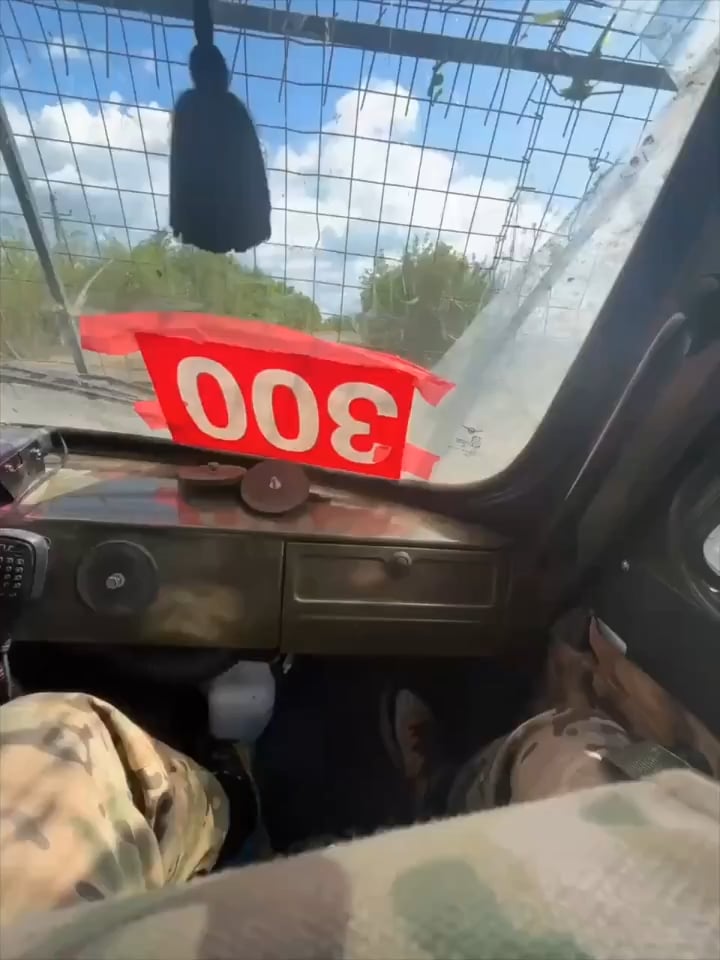 First-person footage from inside a Russian UAZ "Bukhanka" getting hit by a Ukrainian FPV quad.
