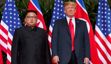 U.S. President Donald Trump, right, with North Korean leader Kim Jong Un on Sentosa Island, in Singapore, June 12, 2018. (AP Photo/Evan Vucci, File)