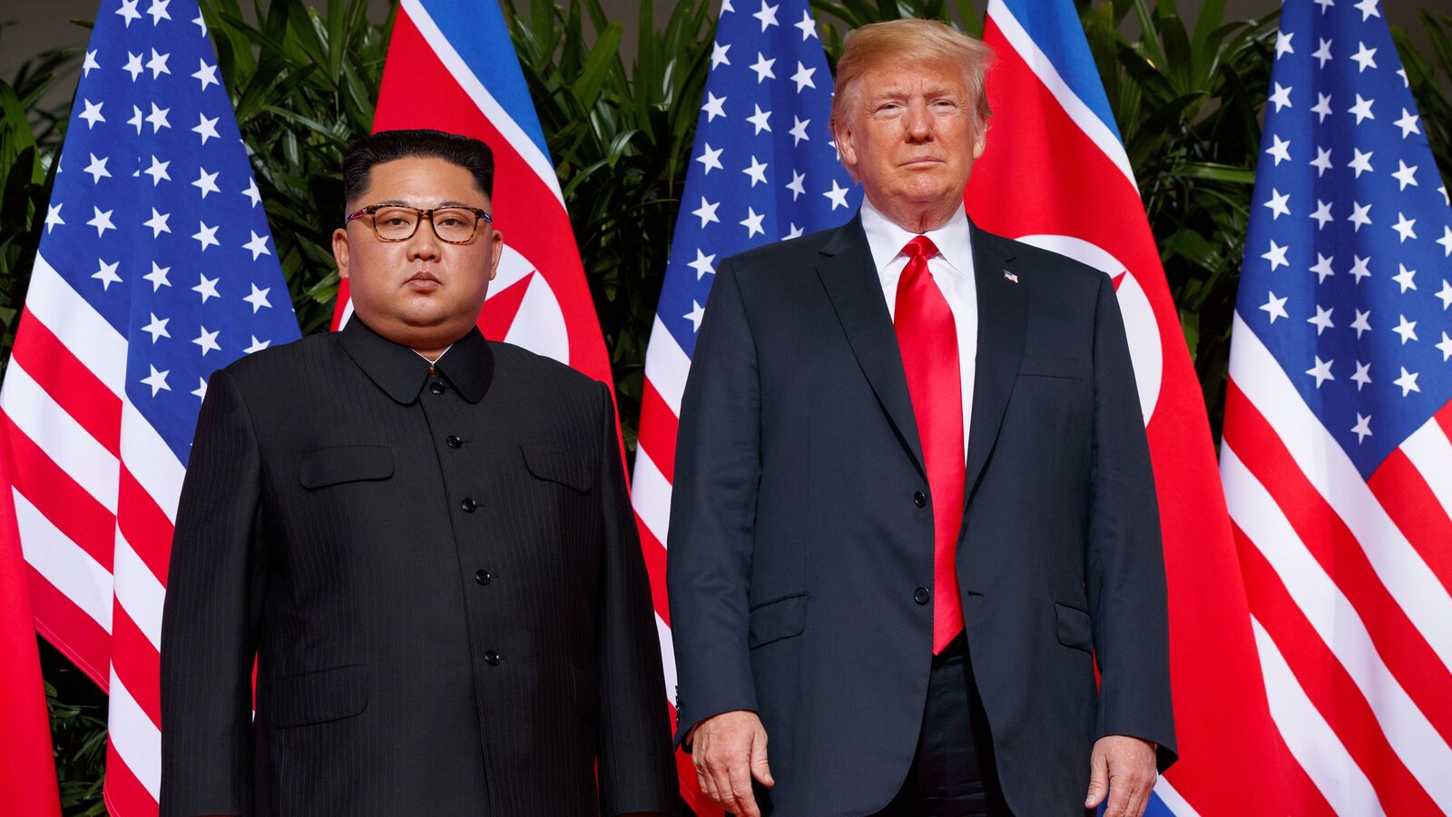 U.S. President Donald Trump, right, with North Korean leader Kim Jong Un on Sentosa Island, in Singapore, June 12, 2018. (AP Photo/Evan Vucci, File)