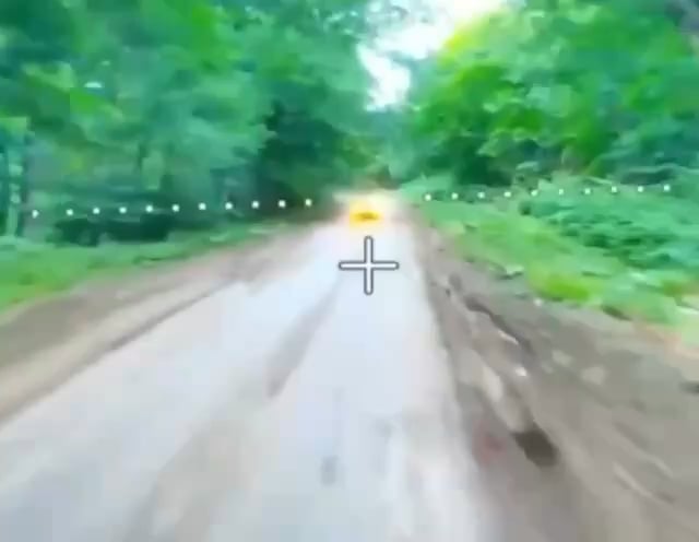 A Russian narrowly avoids a Ukrainian drone. Location and date unknown.