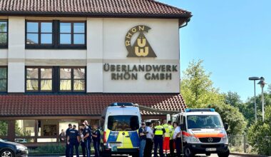 Police and emergency services stand on the premises of regional grid operator Überlandwerk Rhön, after a man armed with a “sharp object” attacked people at the company, killing at least one, police said, in Mellrichstadt, Germany, on July 1.