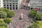 Revelers march down the Leipziger Strasse street during a Pride parade in Berlin, July 23, 2022.