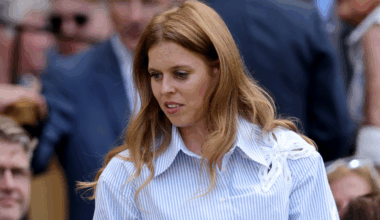 Princess Beatrice wearing a blue striped shirt