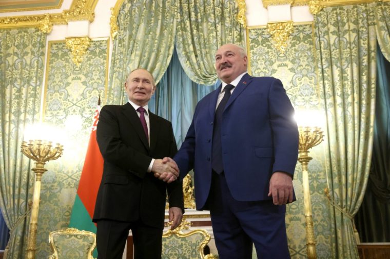 MOSCOW, RUSSIA - MARCH 13 (RUSSIA OUT) Russian President Vladimir Putin (L) greets Belarusian President Alexander Lukashenko (R) during their bilateral meeting at the Grand Kremlin Palace, March 13, 2025, in Moscow, Russia. President of Belarus Lukashenko is having first foreign trip after re-election. (Photo by Contributor/Getty Images)
