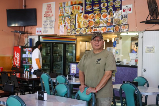 La Enramada Restaurant owner Onofre Vizcarra stands in the empty...