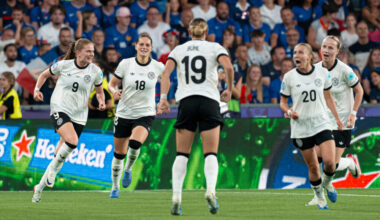 Germany players run toward Klara Bühl to celebrate their penalty shootout victory against France in the UEFA Women's Euro 2025 quarterfinal at St. Jakob-Park in Basel, Switzerland.