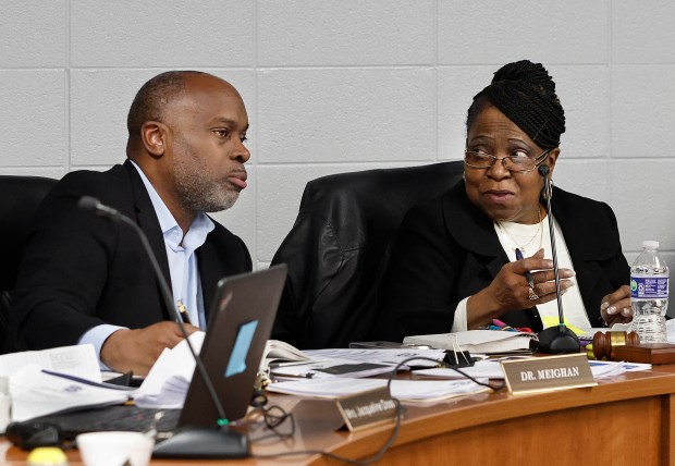 Superintendent Dr. Duane Meighan (left) and President Sharon Mack (right) discuss parent concerns at a Country Club Hills School District 160 boarding meeting. The parents have concerns about district spending and conditions in the schools. The meeting took place on Tuesday, May 20, 2025. (John Smierciak / for the Daily Southtown)
