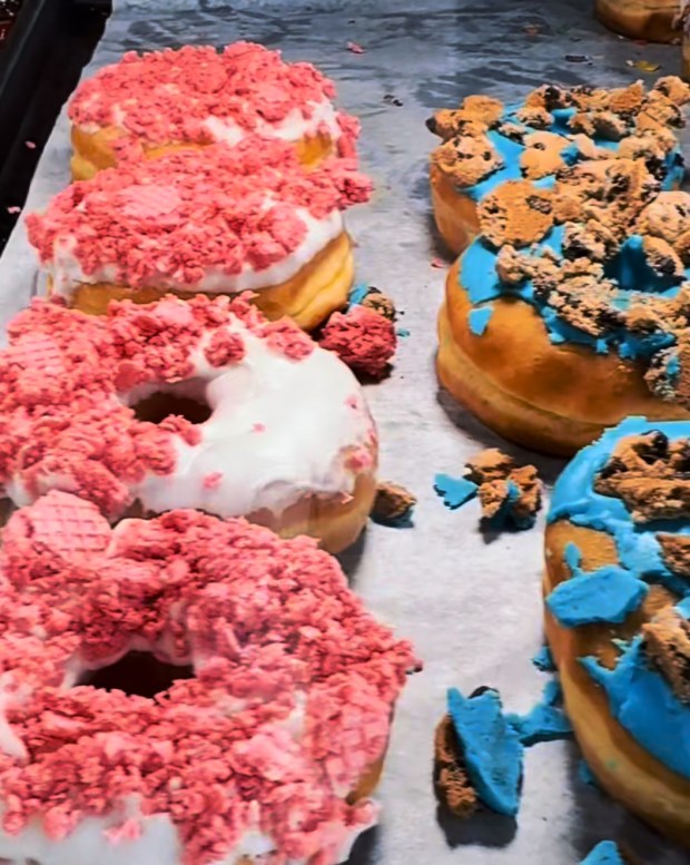 Strawberry Crumble and Cookie Monster donuts are on display at Donut Dudes in Chicago's Mt. Greenwood neighborhood. (Bridget Forbes)