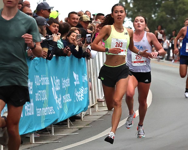 Gillian Meeks, left, and Hanne Thomsen battle for second place...