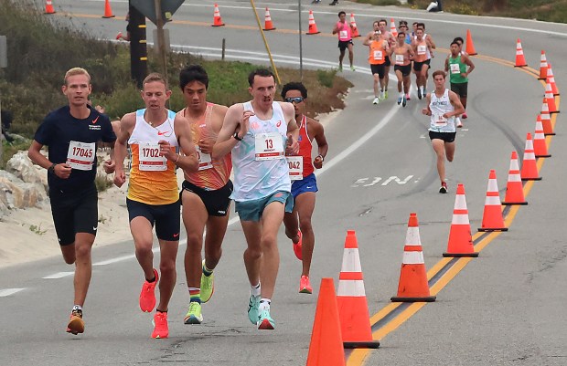 From left, Arturs Medveds, Galen Rupp, Robert Miranda, and Anthony...
