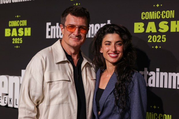 Nathan Fillion, left, and Tania Raymonde attend Entertainment Weekly's Comic-Con Bash on Saturday, July 26, 2025, in San Diego. (Photo by Andrew Park/Invision/AP)