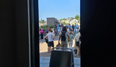 How to make tourists respect an ongoing funeral?