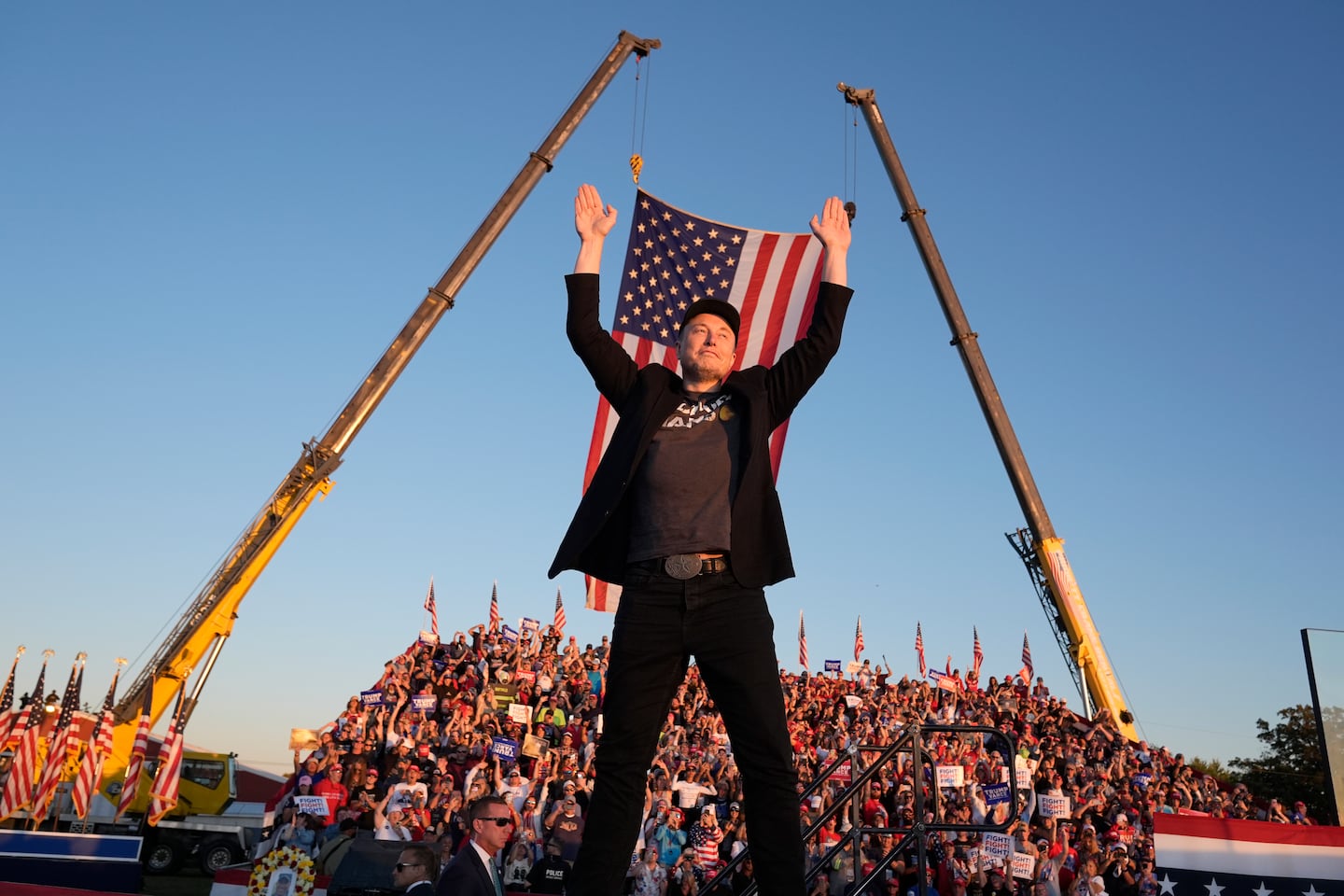Tesla and SpaceX CEO Elon Musk walks to the stage to speak at the Butler Farm Show, Oct. 5, 2024, in Butler, Pa.