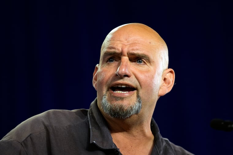 Sen. John Fetterman (D. Pa.) speaks ahead of Democratic vice presidential candidate Minnesota Gov. Tim Walz during a campaign event in York, Pa, Oct. 2, 2024.