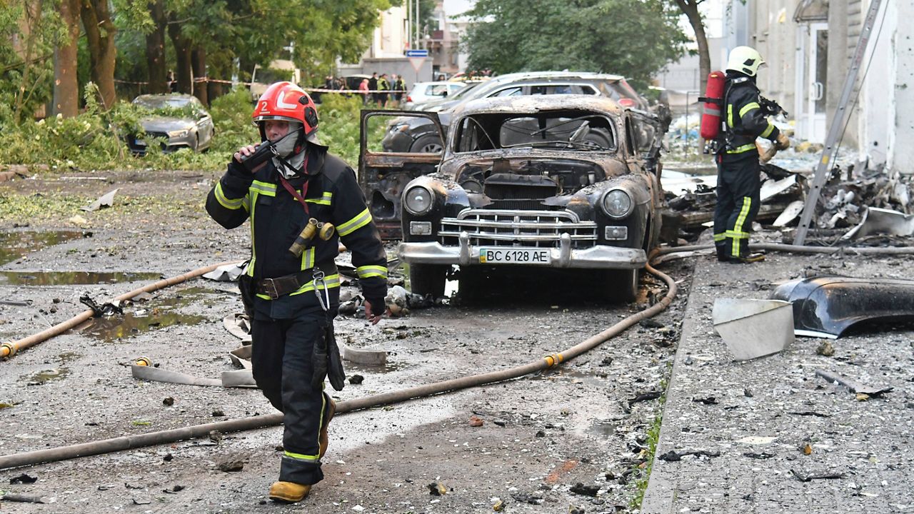 Firefighters work at the site of Russian air attack in Lviv, Ukraine, Saturday, July 12, 2025. (AP Photo/Mykola Tys)