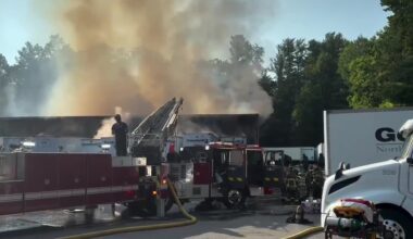 Large business fire shuts down road in Asheville